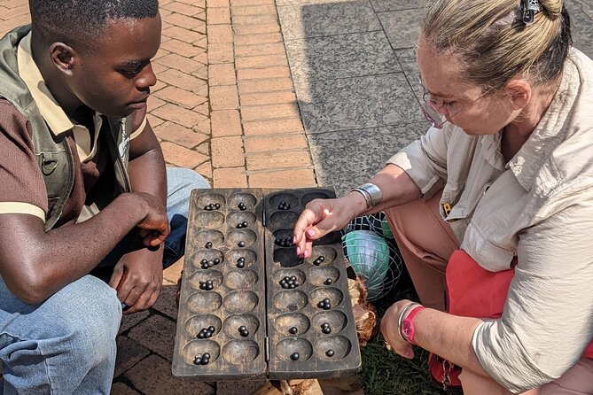 Kigali City Center Guided Walking Tour - Walking toward the Belgian Peacekeepers Memorial