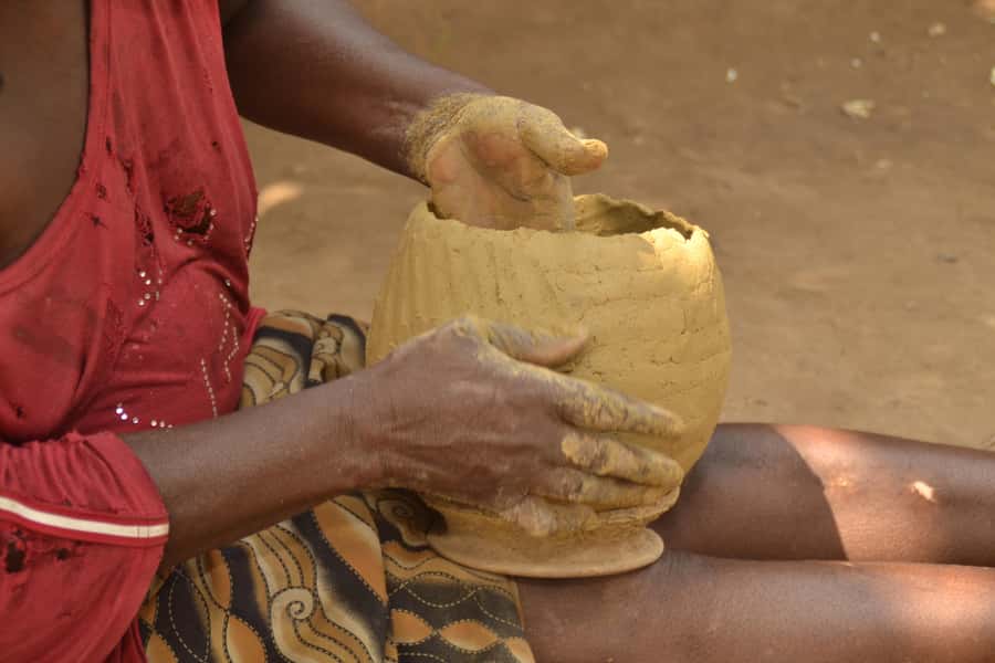 Kigali: Traditional Kubumba Pottery Making with Local Women - A coffee shop setting with art around you